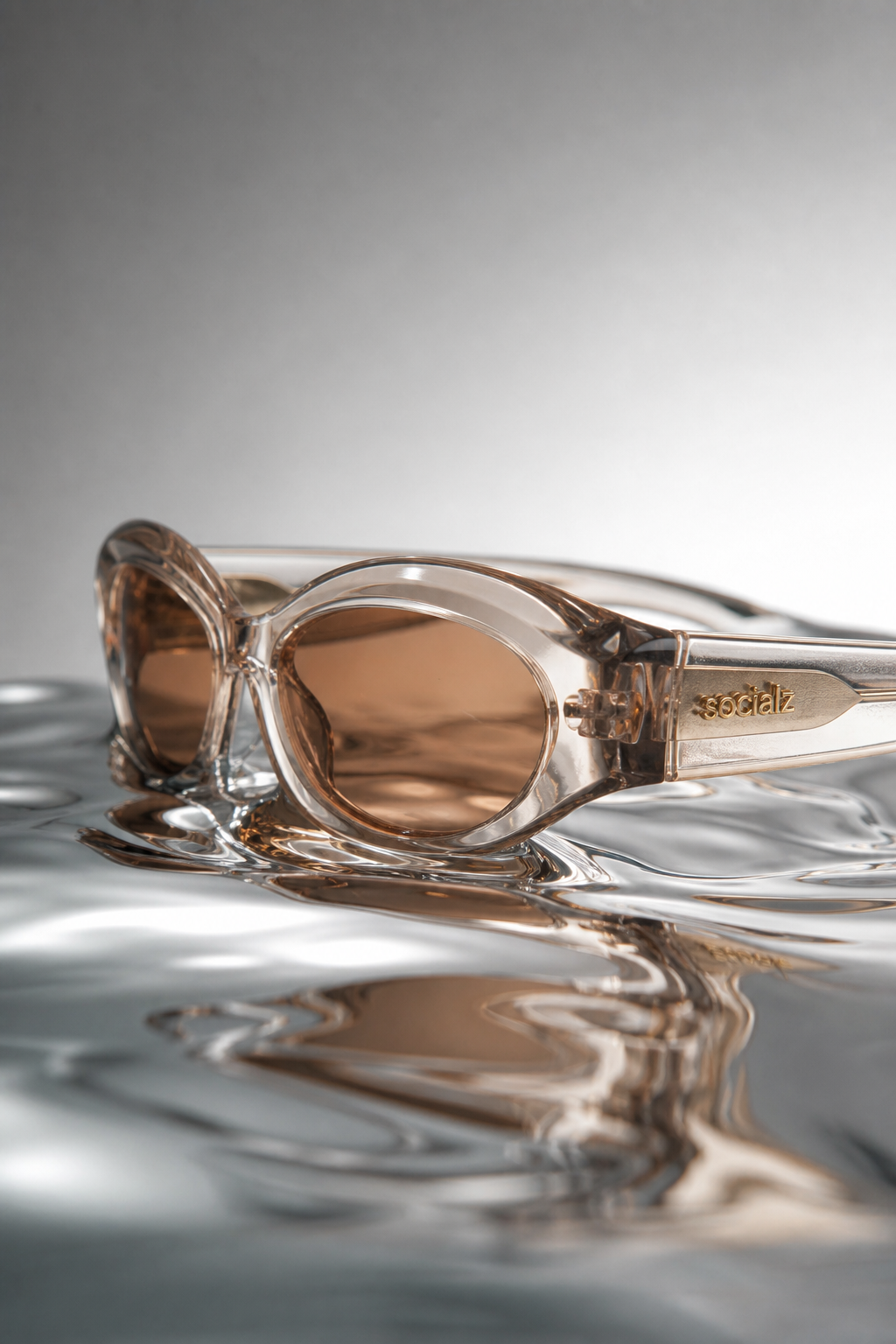 socialz imaginary eyewear resting on reflective water